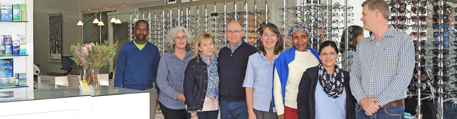 About Us - Eden Optometrists Knysna: Team: Wilson Sitemela, Karen Coetzee, Alison Muir, Andy Muir, Magdalena Bondt, Rosalien Williams & Johan Van Der Meer.